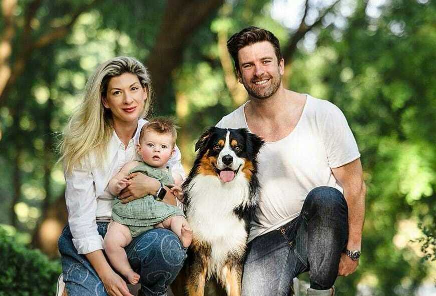 happy-family-australian-shepherd.webp Happy family with their new Australian Shepherd puppy